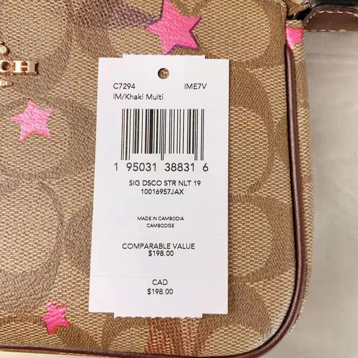 Coach C7294 Nolita 19 In Signature Canvas With Disco Star Print In Khaki Multi Coach C7294 Nolita 19 In Signature Canvas With Disco Star Print In Khaki Multi